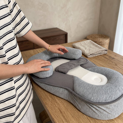 Inclined baby lounger featuring cushioned support and breathable cotton cover, designed for comfort and safety for infants. 3