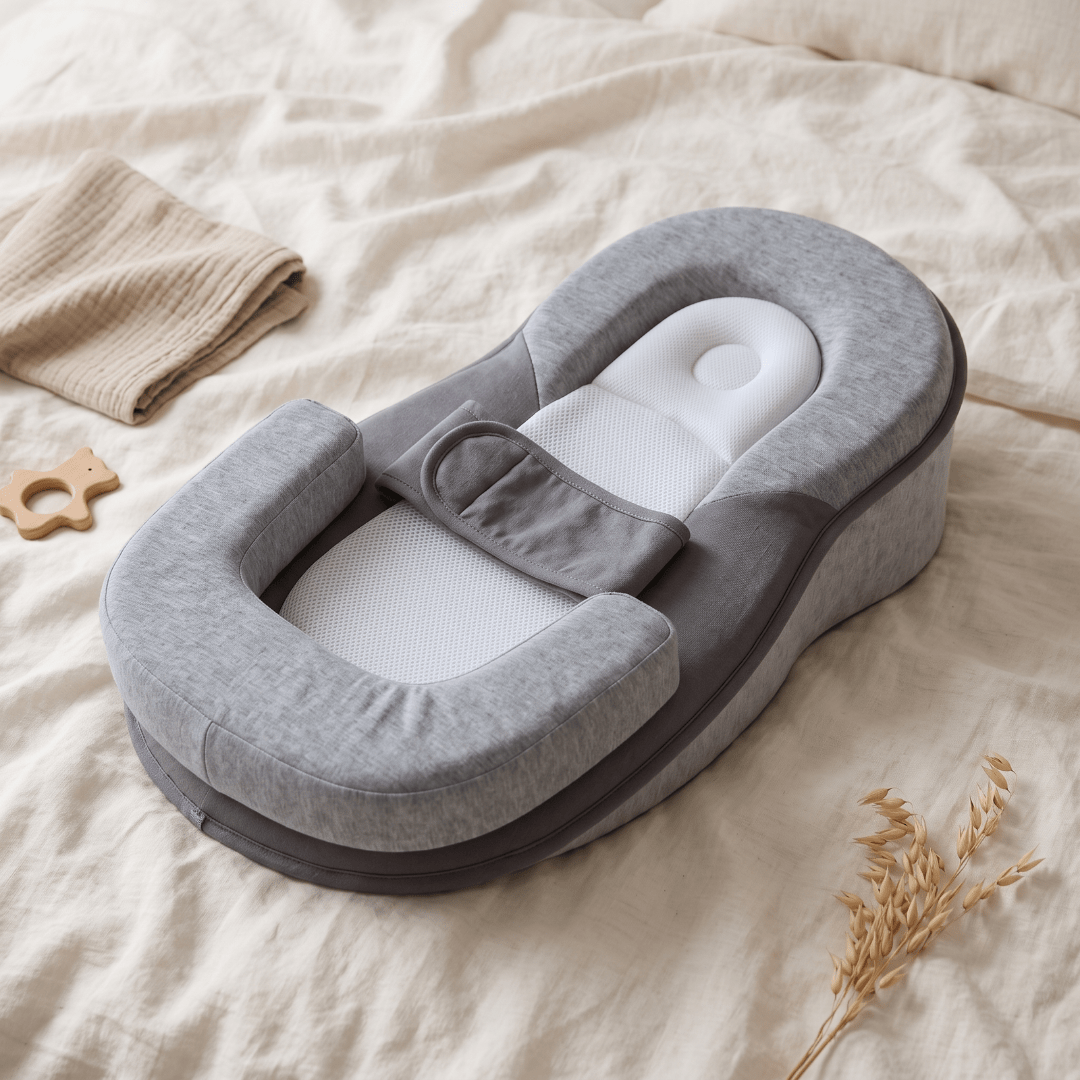 Inclined baby lounger featuring cushioned support and breathable cotton cover, designed for comfort and safety for infants. 6
