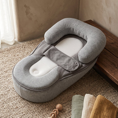 Inclined baby lounger featuring cushioned support and breathable cotton cover, designed for comfort and safety for infants. 4