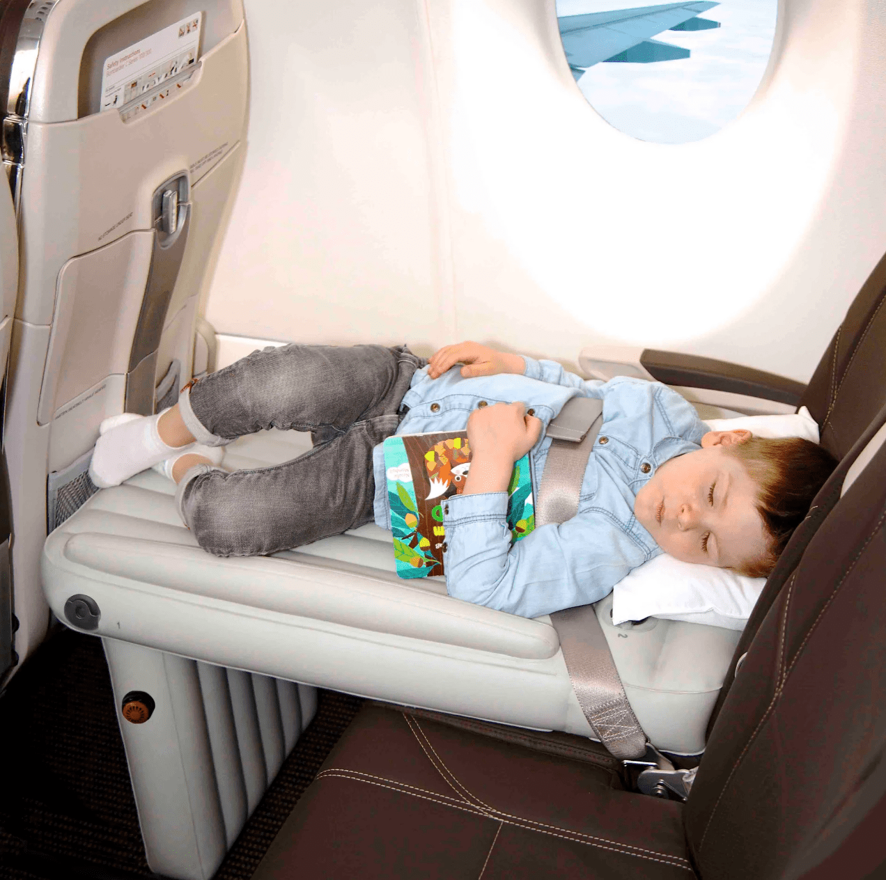 Inflatable bed for kids made of durable PVC, designed for easy setup and travel, perfect for airplane use. 3