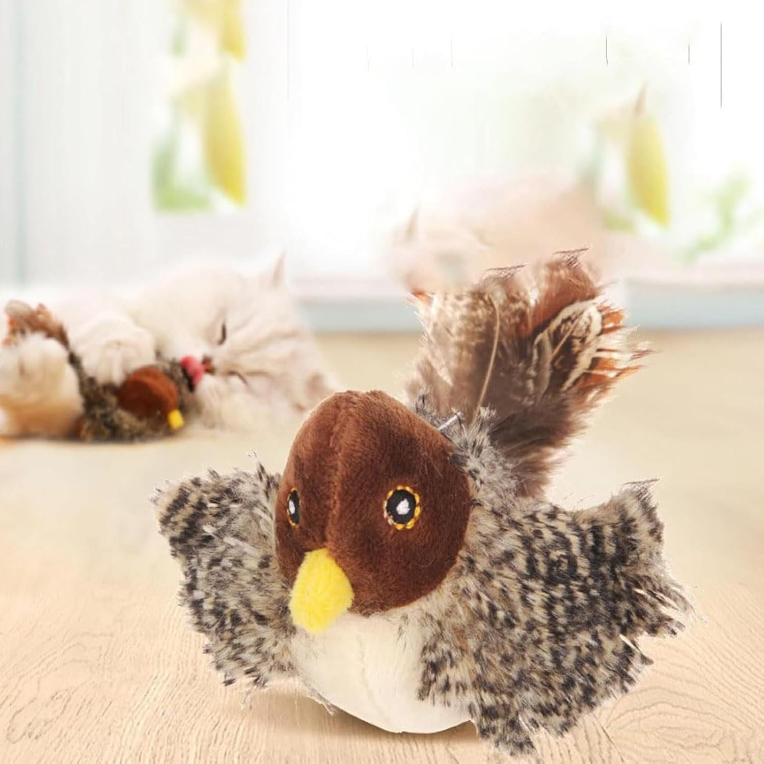 Interactive cat toy featuring lifelike bird sounds and movements, designed for indoor cats, with a rechargeable and durable build. 1
