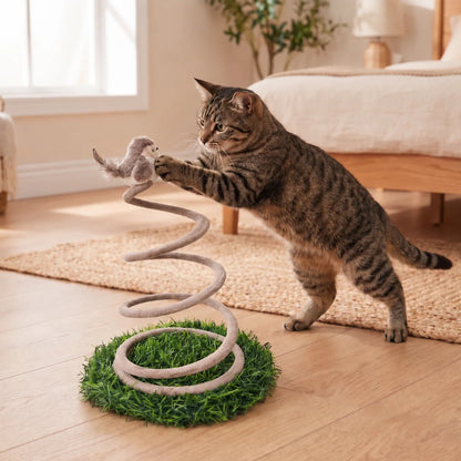 Interactive cat toy featuring a spring bird atop a grass base, designed to stimulate indoor cats' hunting instincts and provide engaging playtime. 0