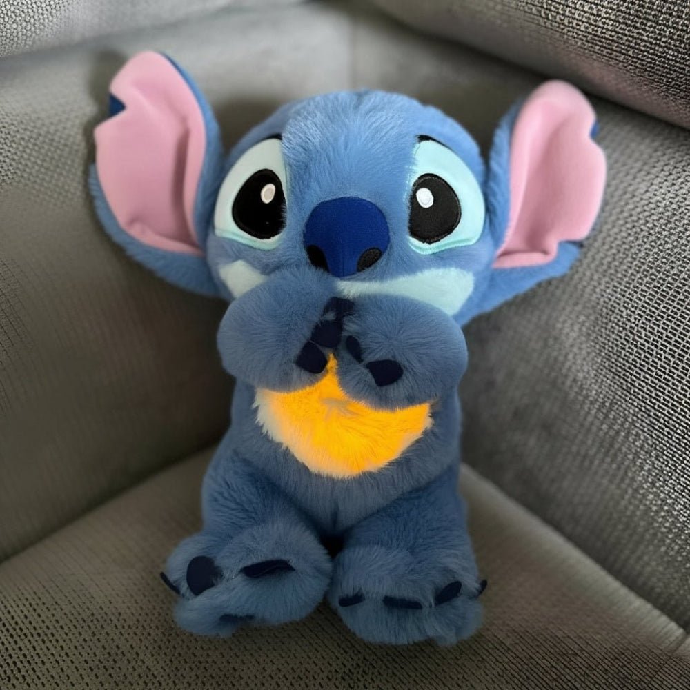 Interactive plush toy featuring a soothing breathing light and gentle sound, designed as a soft calming companion for kids. 8