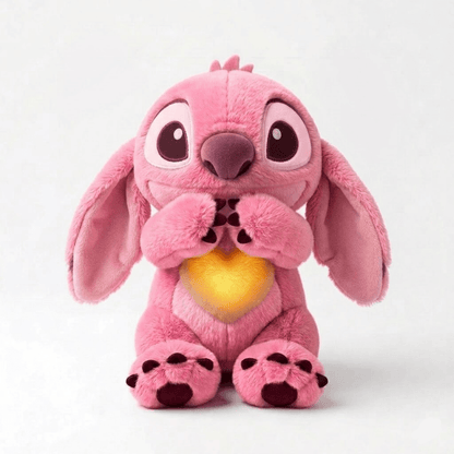 Interactive plush toy featuring a soothing breathing light and gentle sound, designed as a soft calming companion for kids. 2