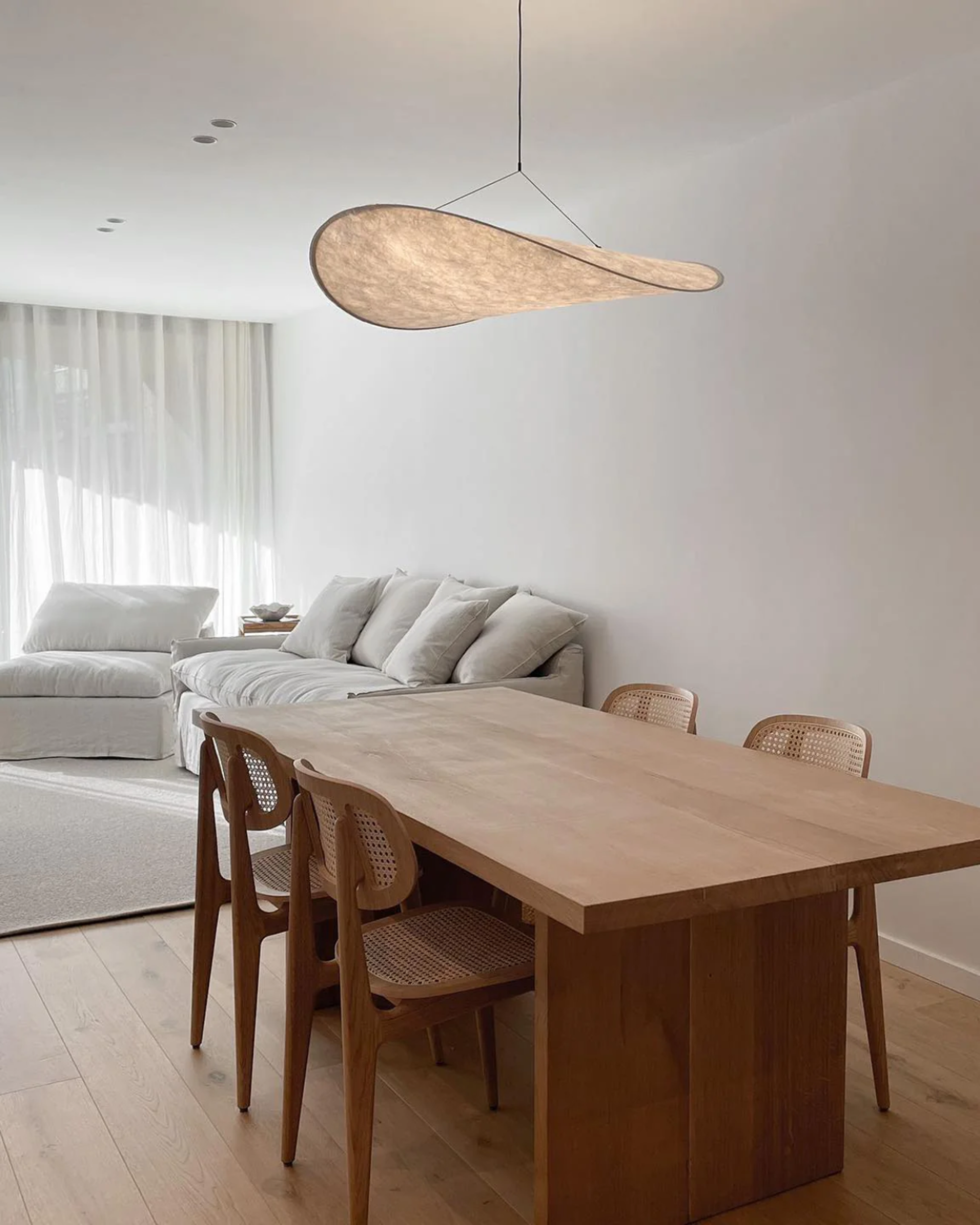 Japandi pendant lamp featuring an eclipse effect, designed with dimmable artificial silk, perfect for modern kitchen lighting. 3