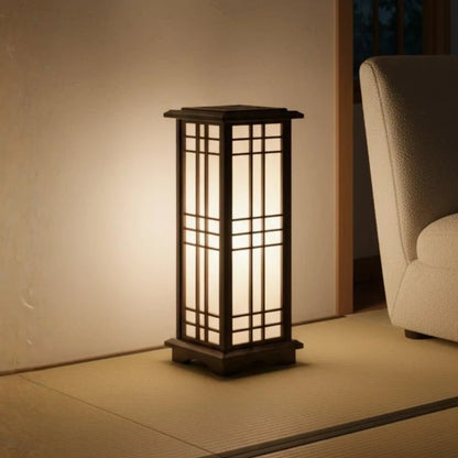 Japanese Shoji lamp featuring a warm glow and a stylish wood frame, ideal for enhancing the ambiance of living rooms or entryways with its elegant traditional design 1