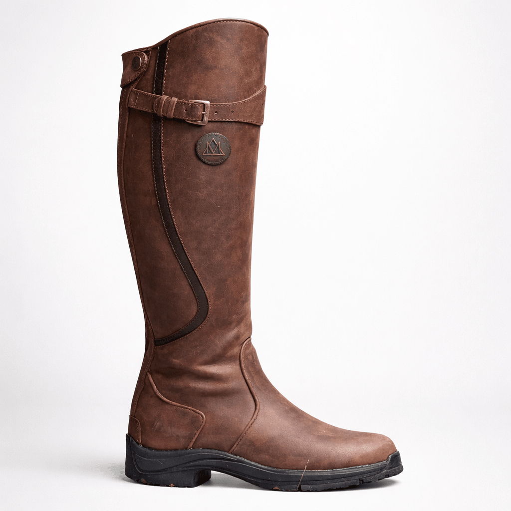 Knee-high leather equestrian riding boots for women featuring arch support and an adjustable fit, perfect for comfort and style in horseback riding. 2