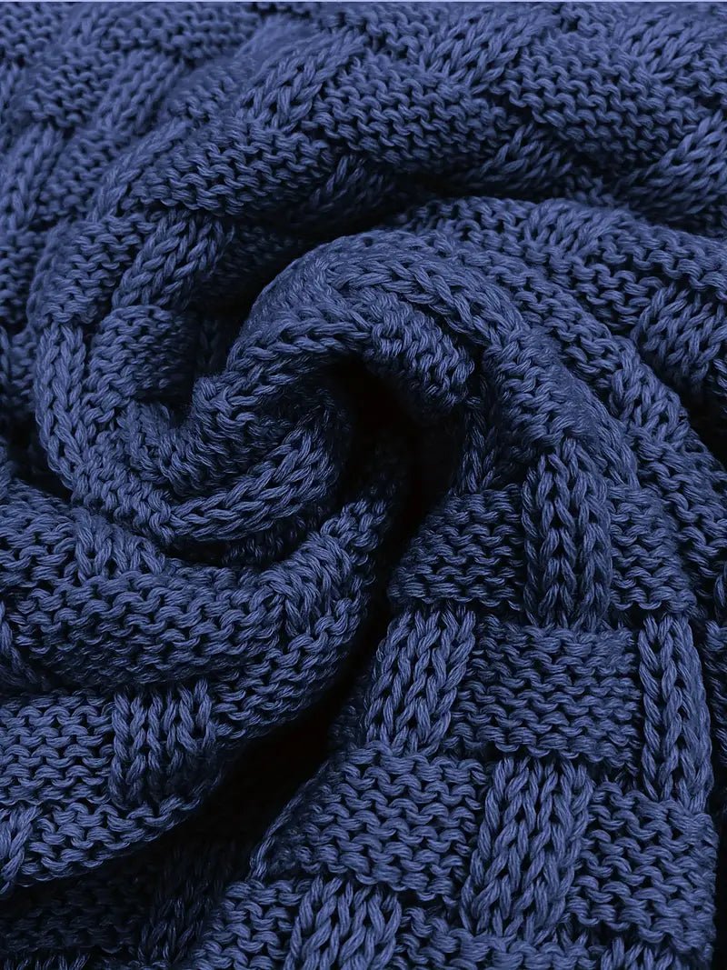 Knitted sweater featuring a high collar and unique woven pattern, showcasing modern soft knit fashion for stylish winter wear. 8