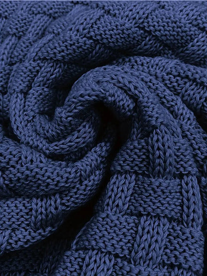 Knitted sweater featuring a high collar and unique woven pattern, showcasing modern soft knit fashion for stylish winter wear. 8