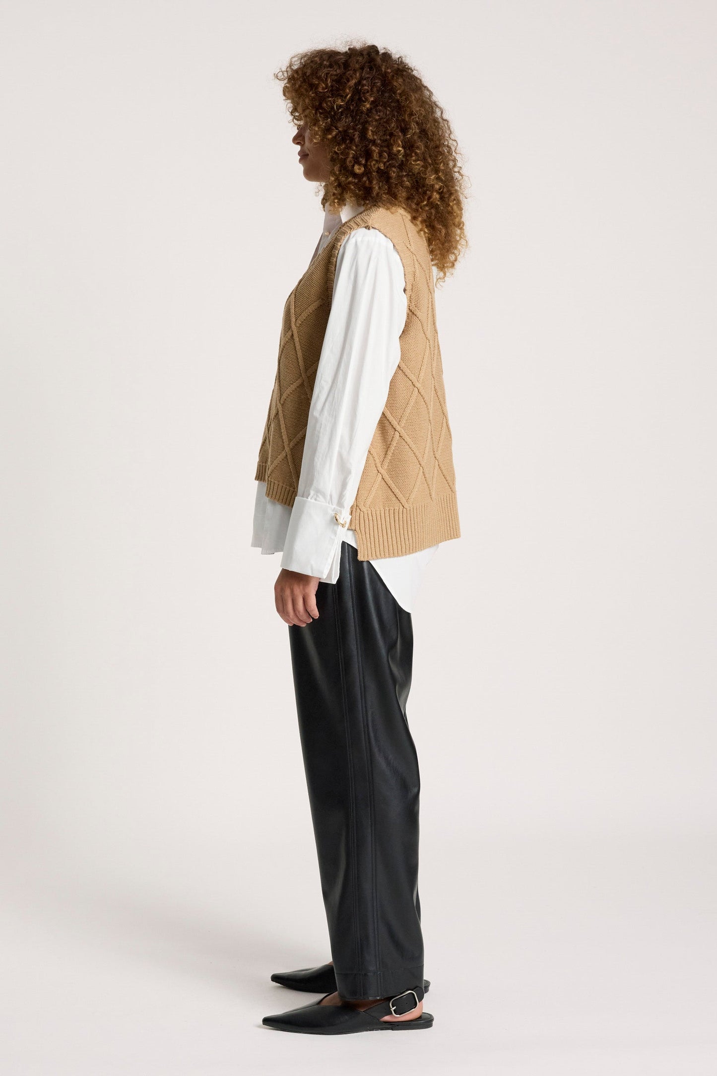 Knitted vest for women featuring a V-neck and checkerboard pattern, made from breathable cotton in a stylish mocha color, perfect for layering. 6