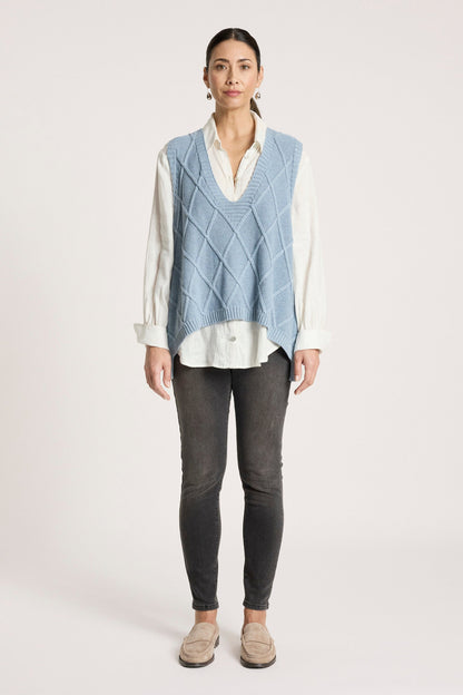 Ladies knitted vest featuring a stylish checkerboard pattern, crafted from breathable cotton with a V-neck design, perfect for layering in any season. 3