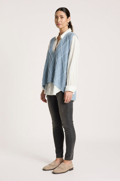 Ladies knitted vest featuring a stylish checkerboard pattern, crafted from breathable cotton with a V-neck design, perfect for layering in any season. 6