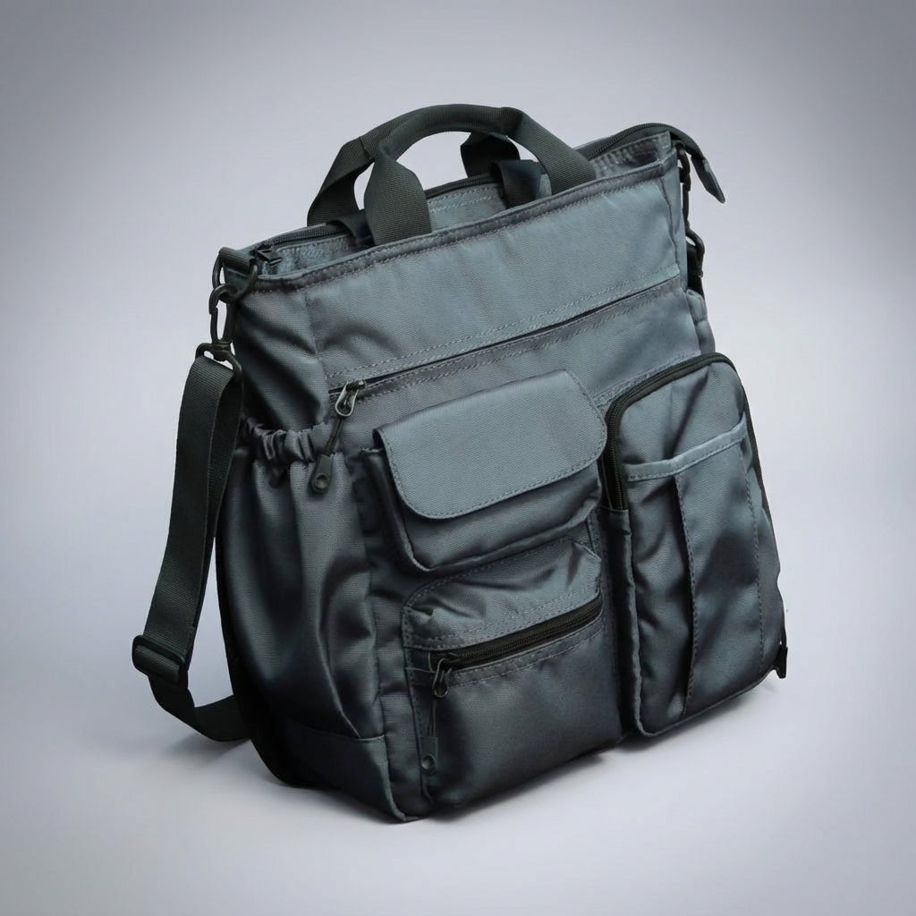 Stylish laptop work bag made of durable Oxford textile, featuring multiple compartments and a padded shoulder strap for comfortable carrying, ideal for business professionals. 2