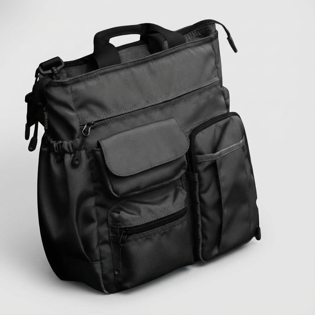 Stylish laptop work bag made of durable Oxford textile, featuring multiple compartments and a padded shoulder strap for comfortable carrying, ideal for business professionals. 0