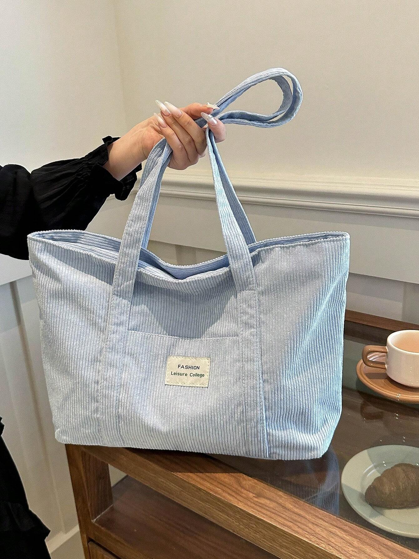Large corduroy tote bag featuring a retro design, perfect for school and work, offering spacious storage and comfortable everyday use. 3