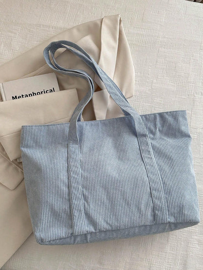 Large corduroy tote bag featuring a retro design, perfect for school and work, offering spacious storage and comfortable everyday use. 6
