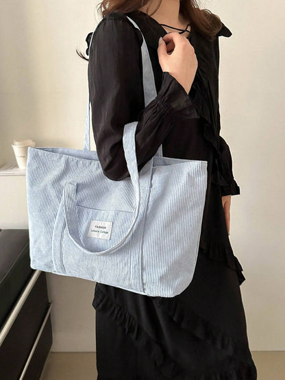 Large corduroy tote bag featuring a retro design, perfect for school and work, offering spacious storage and comfortable everyday use. 4