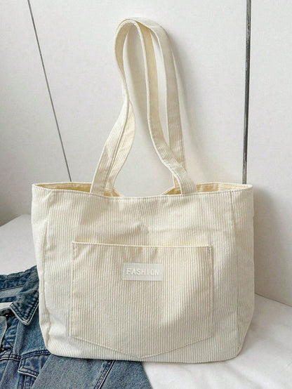 Large corduroy tote bag featuring a retro design, perfect for school and work, offering spacious storage and comfortable everyday use. 8