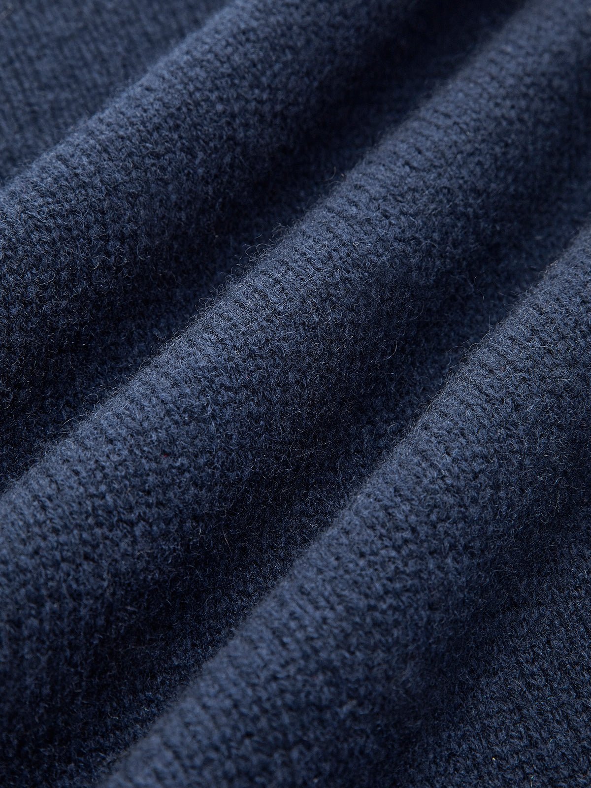Layered knit polo sweater in navy featuring a denim collar and gold-tone buttons, perfect for stylish and casual outfits. 4