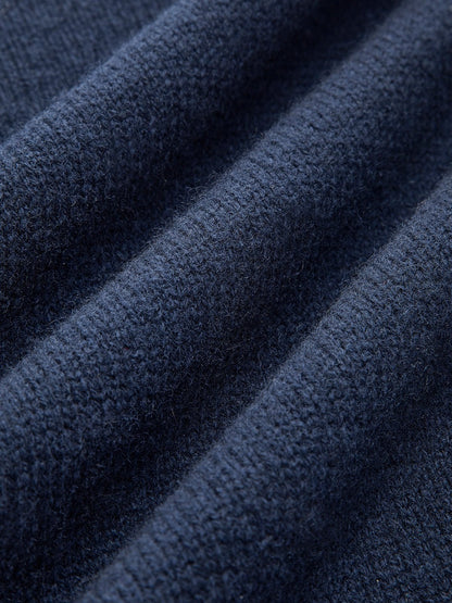 Layered knit polo sweater in navy featuring a denim collar and gold-tone buttons, perfect for stylish and casual outfits. 4