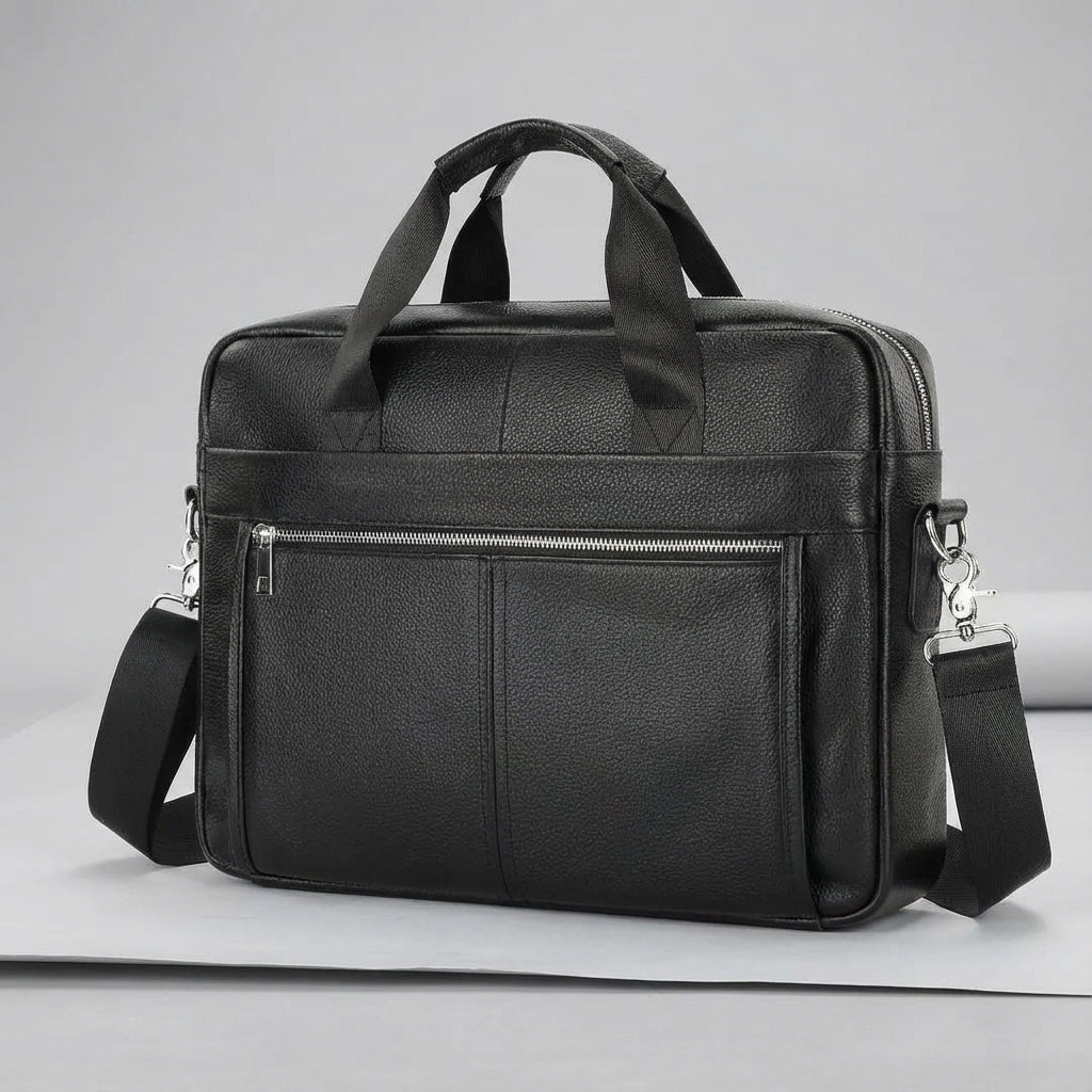 Leather briefcase for men with adjustable strap, featuring a vintage style design in genuine cowhide leather, perfect for carrying laptops and work essentials. 0