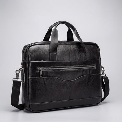 Stylish leather business briefcase featuring a padded laptop compartment, adjustable straps, and handles, perfect for professionals on the go. 0