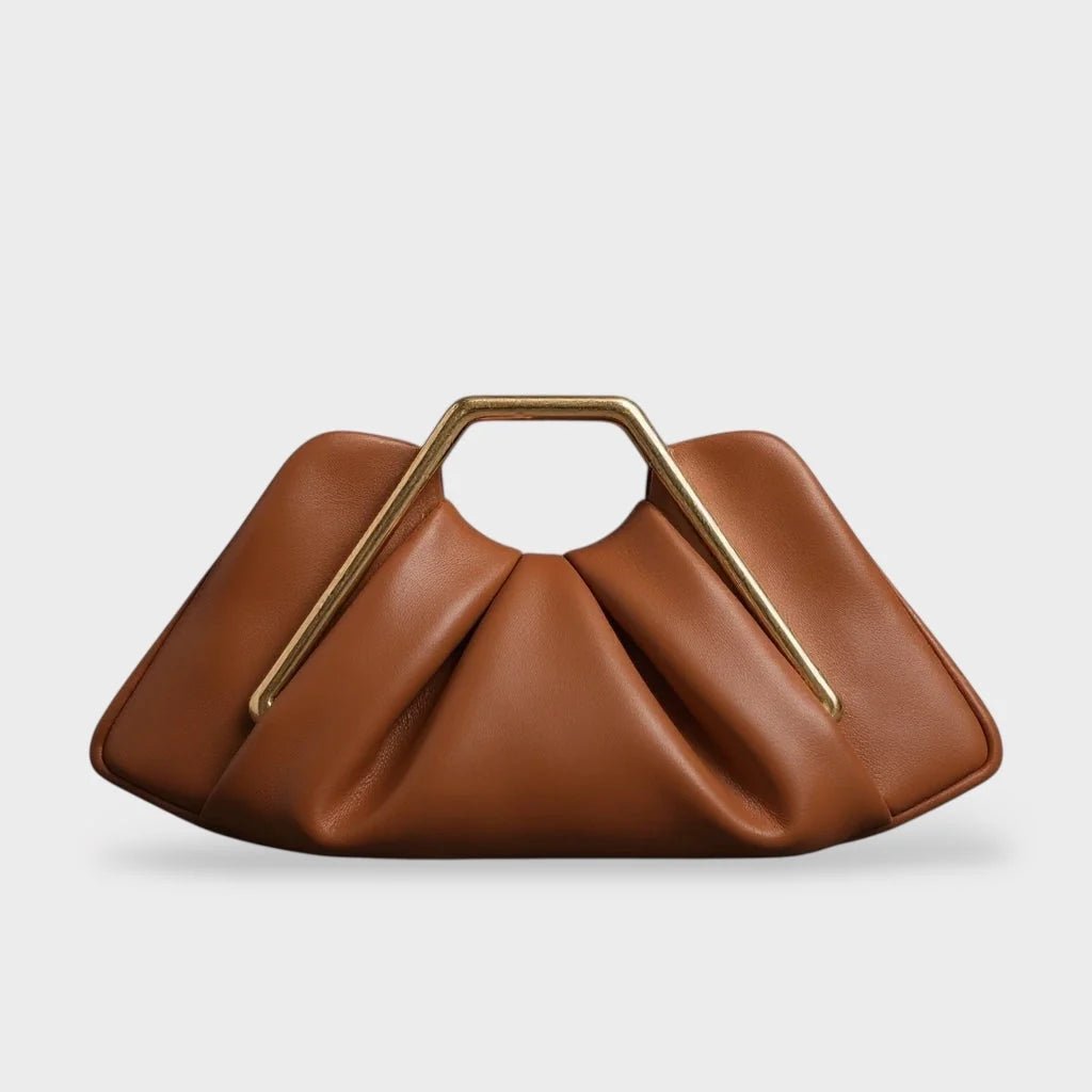 Stylish leather clutch bag featuring a gold handle and spacious interior, designed in a modern origami style with high-quality microfiber leather. 0