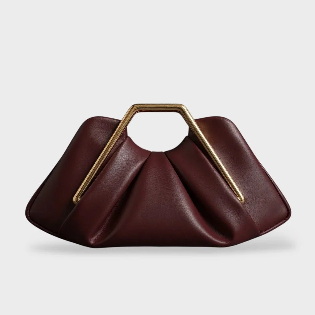 Stylish leather clutch bag featuring a gold handle and spacious interior, designed in a modern origami style with high-quality microfiber leather. 7