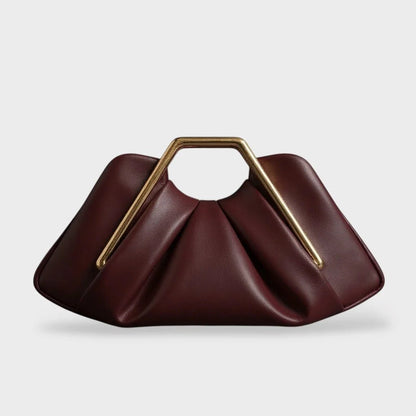 Stylish leather clutch bag featuring a gold handle and spacious interior, designed in a modern origami style with high-quality microfiber leather. 7