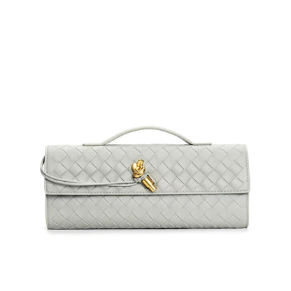 Leather handbag featuring a stylish buckle, crafted from compact natural leather, perfect for everyday use. 0