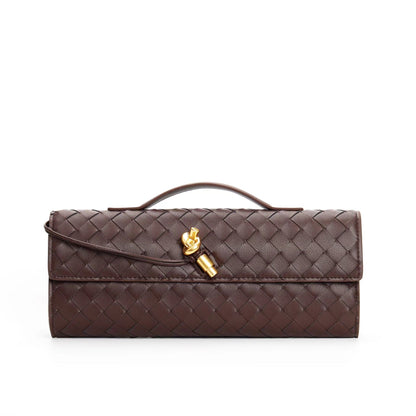 Leather handbag featuring a stylish buckle, crafted from compact natural leather, perfect for everyday use. 8