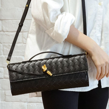 Leather handbag featuring a stylish buckle, crafted from compact natural leather, perfect for everyday use. 1