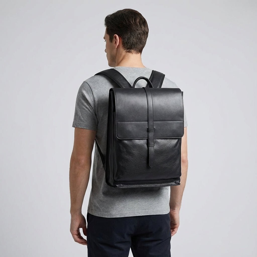 Leather laptop backpack designed for 17-inch laptops, featuring a multi-compartment layout for organized storage, crafted from premium cowhide, ideal for professional men 2