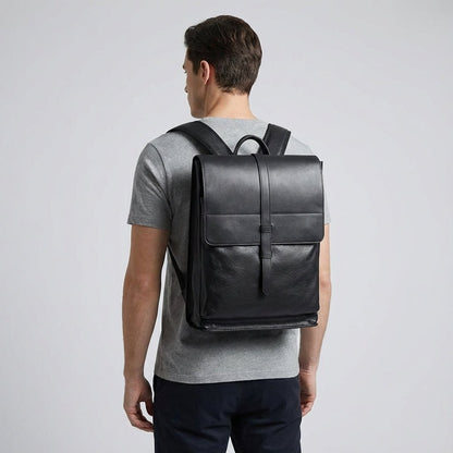 Leather laptop backpack designed for 17-inch laptops, featuring a multi-compartment layout for organized storage, crafted from premium cowhide, ideal for professional men 2