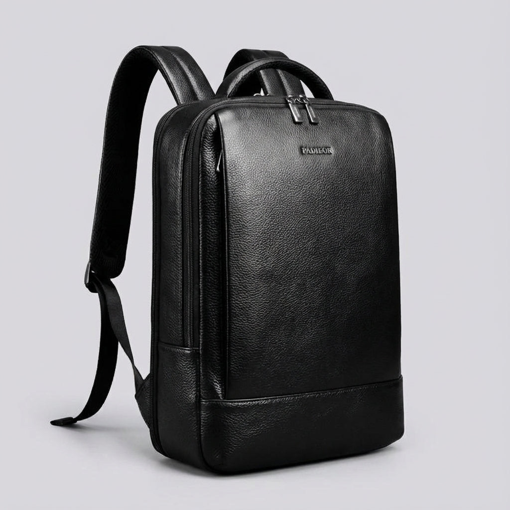 Stylish full grain leather laptop backpack designed for 17-inch devices featuring a padded compartment for protection and comfort. 1