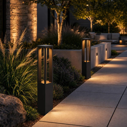 LED Bollard Light in black die-cast aluminum, featuring adjustable height for customizable outdoor landscape lighting. Ideal for pathways and gardens. 8