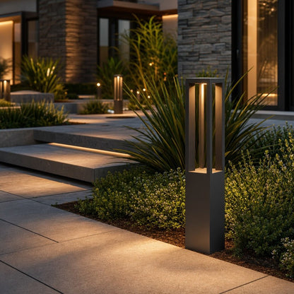 LED Bollard Light in black die-cast aluminum, featuring adjustable height for customizable outdoor landscape lighting. Ideal for pathways and gardens. 0
