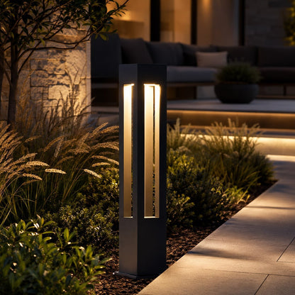 LED Bollard Light in black die-cast aluminum, featuring adjustable height for customizable outdoor landscape lighting. Ideal for pathways and gardens. 2