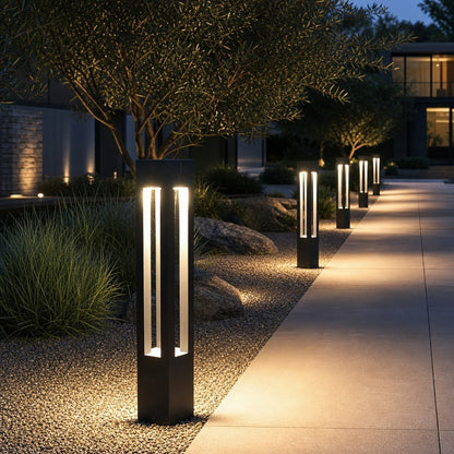 LED Bollard Light in black die-cast aluminum, featuring adjustable height for customizable outdoor landscape lighting. Ideal for pathways and gardens. 1