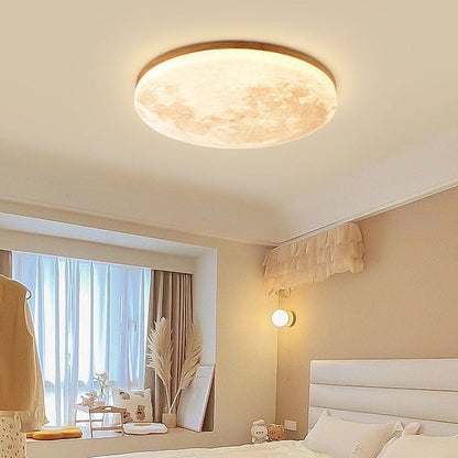 LED ceiling lamp featuring a moonlight effect, designed with a modern minimalist aesthetic in solid wood and acrylic materials. 0