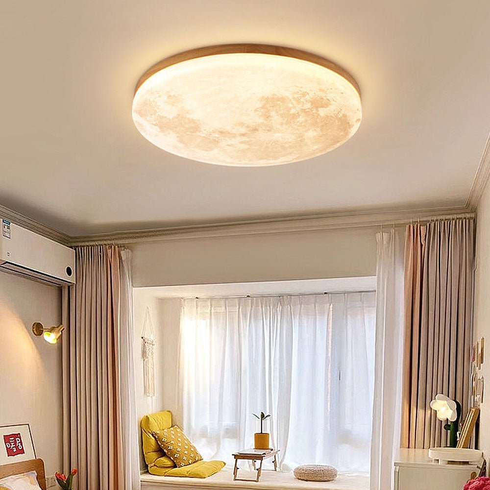 LED ceiling lamp featuring a moonlight effect, designed with a modern minimalist aesthetic in solid wood and acrylic materials. 2