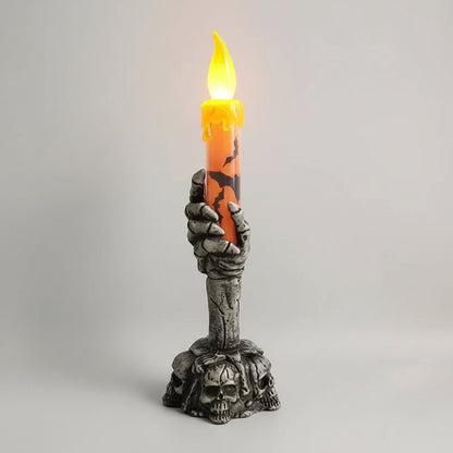 LED decorative candles featuring a spooky Halloween skeleton design in vibrant orange and green, perfect for adding a festive accent to Halloween parties and celebrations. 1