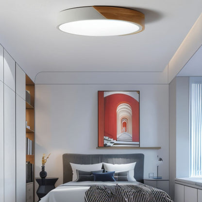 LED flush mount ceiling light featuring a sleek wooden frame, designed with a modern minimalist aesthetic, perfect for enhancing the ambiance of bedrooms and living rooms. 2