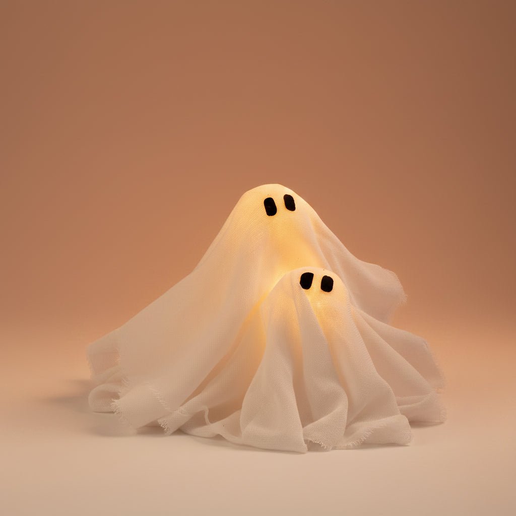 LED Ghost Wreath featuring battery-operated lights and spooky gauze accents, perfect for Halloween door decoration. 3