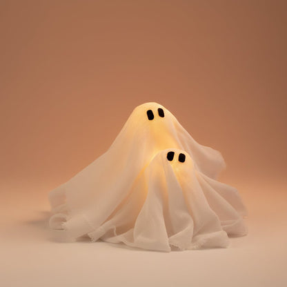 LED Ghost Wreath featuring battery-operated lights and spooky gauze accents, perfect for Halloween door decoration. 3