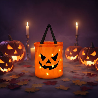 LED Halloween trick or treat bag featuring a reusable pumpkin design with built-in light, perfect for candy collection during Halloween festivities. 5