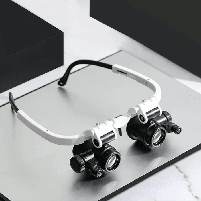LED magnifying glass featuring adjustable lenses and built-in light, designed for precision tasks, showcasing a lightweight and ergonomic design for easy handling. 0