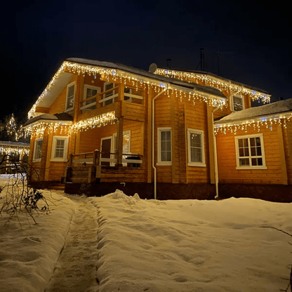 LED outdoor light curtains with twinkling effect, measuring 4 meters, in warm white, waterproof IP44 string lights perfect for festive decorations. 1