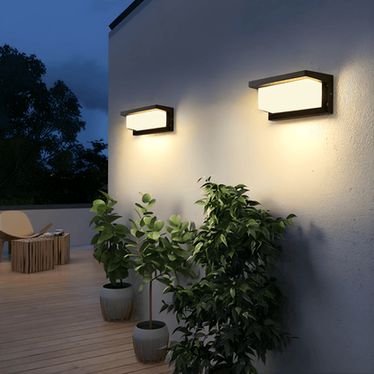 LED outdoor wall light featuring a motion sensor, designed for durability with IP65 weatherproof rating, emitting warm white light for enhanced security and ambiance. 5