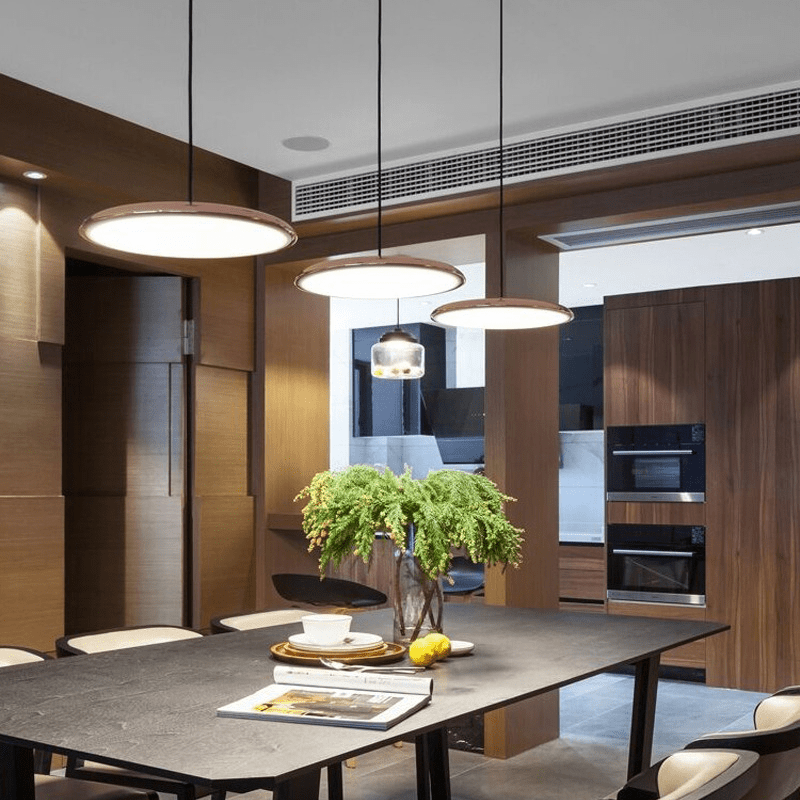 Scandinavian-style LED pendant lamp with adjustable cable, featuring a sleek aluminum design, perfect for illuminating kitchen and dining areas. 4